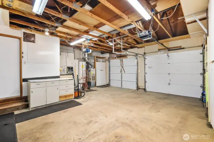Utility Sink in Garage, plus and additional Storage area for Tools or Hobby room (not pictured).