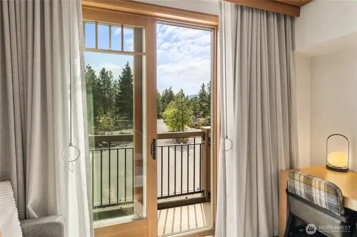 Light-filled space with large windows bringing the outdoors in.