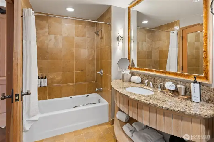Spacious bathroom with clean finishes for everyday comfort.