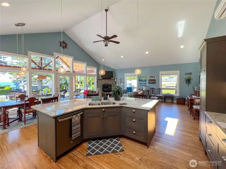 Stunning views from all areas of great room. The center island is a wonderful place to prep the meals and enjoy the amazing outdoor views.