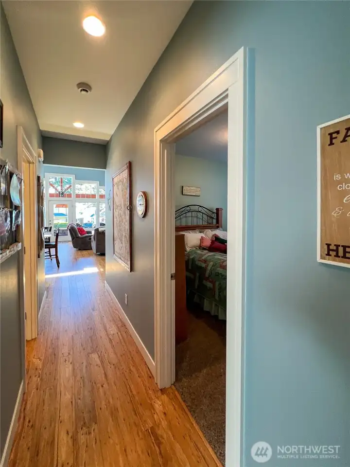 Shot of hallway towards the great room and covered patio.
