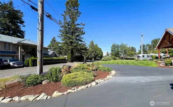Circular blacktopped driveway.