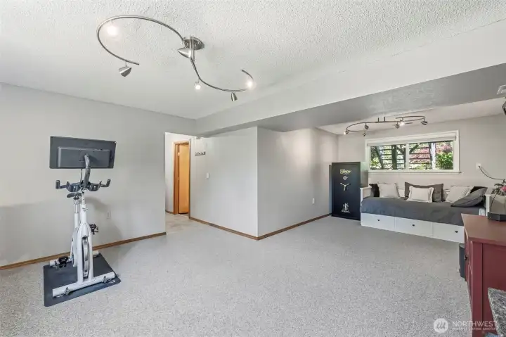 Expansive bonus room offering multiple living zones, natural light, and endless flexibility for entertaining, hobbies, or remote work.