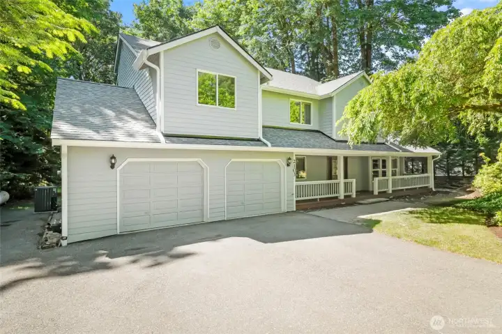 SUN AND SHADE | This home has just the right amount of both! Why yes, that is a new roof!