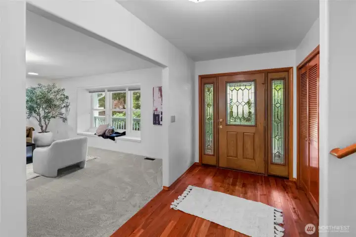 WELCOME IN | After you linger on the charming front porch a while, come in and be enchanted by what this home has to offer inside. Charming window seats, space to spread out, and windows that allow you to view the beauty of the setting from any room.