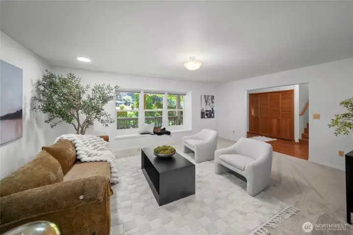LIVING ROOM | Oh, those windows! You'll love the view of the landscaping from the window seat.