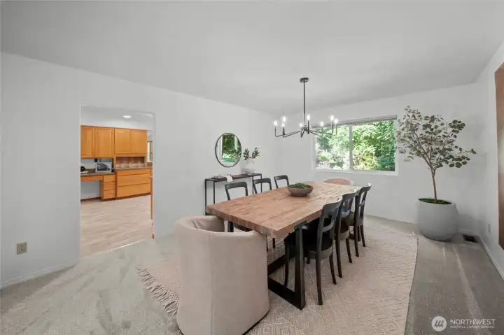 ONE BIG DINING ROOM | Bring your largest dining table to this space! It will fit perfectly under the brand new chandelier and with room to spare.