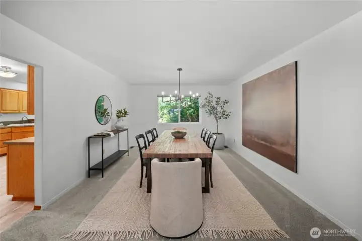 DINING ROOM DRAMA | Step into this room and prepare for goosebumps. This photo doesn't quite capture the scale of this room. Big chandelier, big piece of art on the wall, big dining room table! Yes please. Oh, and NEW carpeting and paint.