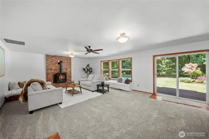 FAMILY ROOM | Oh yeah, this feels like home! Bring your big sectional and TV for gatherings. Then spill out onto the back deck for BBQ's. This is living.