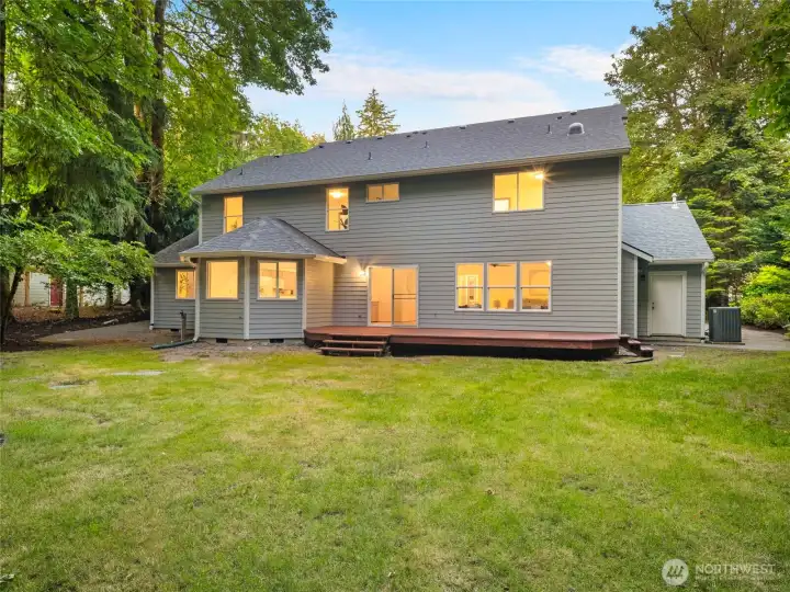 BACKYARD | The big back deck provides a wonderful spot for outdoor lounging, BBQs and just enjoying the peace and quiet of the property.