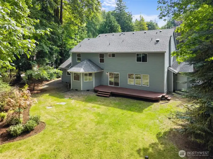 BACKYARD | You'll fall hard for the peaceful, park-like back yard that sets the tone for some exceptional outdoor living. Notice the NEW roof!