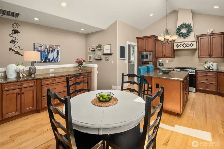 Back inside, there’s plenty of space for a comfortable breakfast nook, while the built-in buffet adds generous storage for linens and more, plus it's an ideal spot for serving food when entertaining. Back inside, there’s plenty of space for a comfortable breakfast nook, while the built-in buffet adds generous storage for linens and more, plus it's an ideal spot for serving food when entertaining.