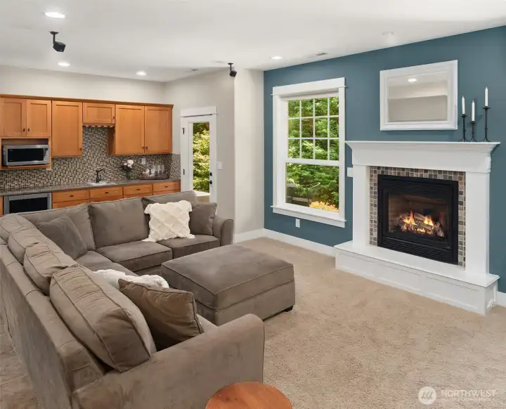 Made for movie nights, game days, weekend guests, or a little extra independence for extended stays, the lower level includes a wet bar with a built-in beverage fridge, sink, cabinetry, and dedicated space for a microwave. Made for movie nights, game days, weekend guests, or a little extra independence for extended stays, the lower level includes a wet bar with a built-in beverage fridge, sink, cabinetry, and dedicated space for a microwave.