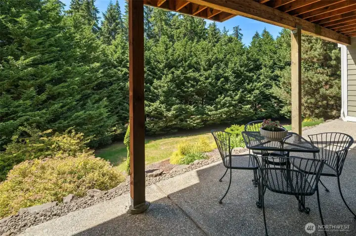 The backyard offers extraordinary privacy, and the property extends more than 100 feet beyond the tree line, giving you far more space and land than the first view reveals. The backyard offers extraordinary privacy, and the property extends more than 100 feet beyond the tree line, giving you far more space and land than the first view reveals.
