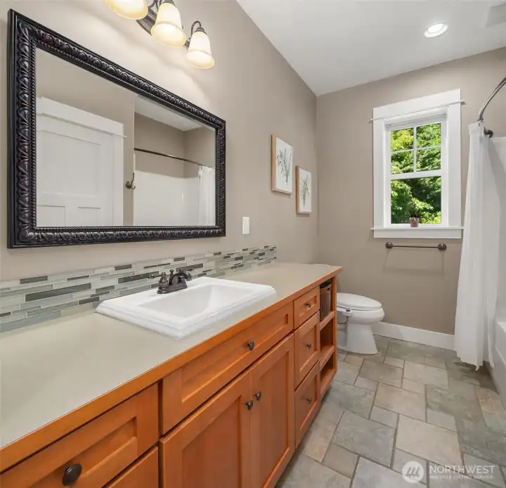 The lower level includes a full bath with the same polished finishes and meticulous care found throughout the home, adding comfort and convenience for guests or extended stays. The lower level includes a full bath with the same polished finishes and meticulous care found throughout the home, adding comfort and convenience for guests or extended stays.