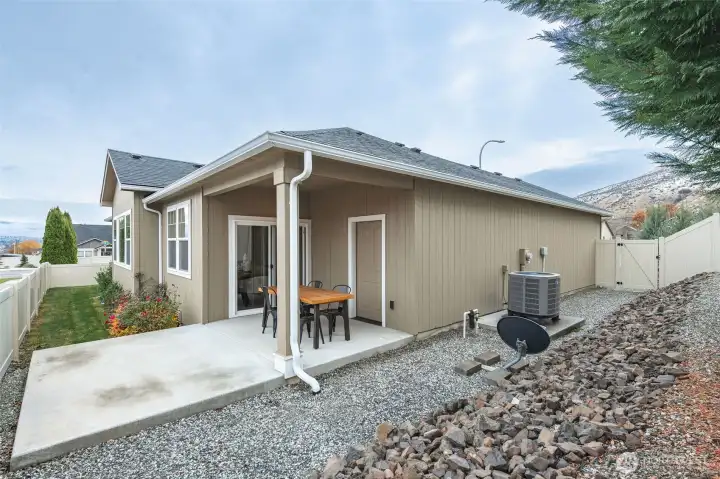 Spacious covered back porch extending your living space outdoors—perfect for year-round entertaining, outdoor dining, or relaxing.