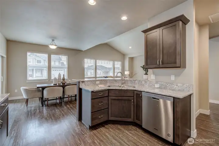 Functional kitchen with ample cabinetry, generous prep space, and an efficient layout.
