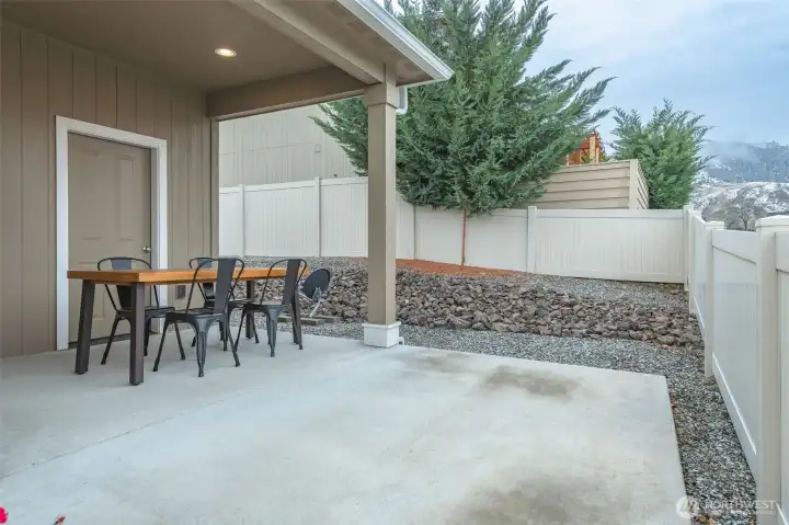 Enjoy morning coffee or evening BBQs from the private covered back porch overlooking the low-maintenance backyard.