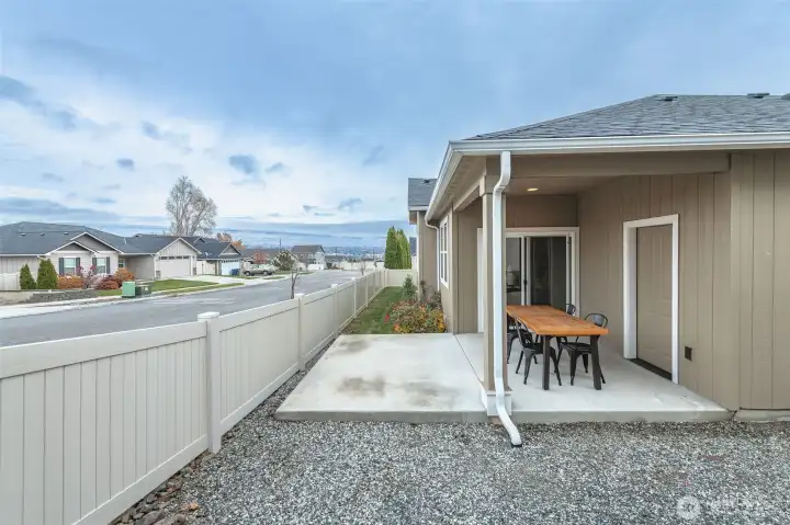 Covered outdoor living area with easy access from the home, ideal for gatherings, grilling, and enjoying every season.