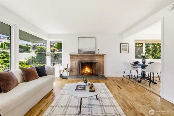 Step inside to the bright living room complete with a real wood burning fireplace for those chilly days and central A/C throughout the home for those hot days Step inside to the bright living room complete with a real wood burning fireplace for those chilly days and central A/C throughout the home for those hot days