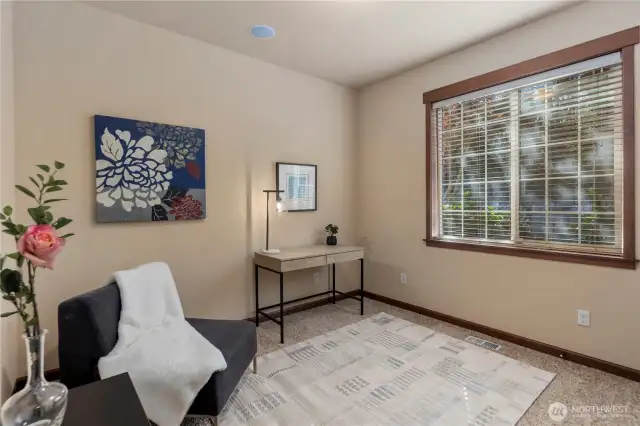 While all other five bedrooms are upstairs, bedroom six is conveniently located on the main floor, currently staged as a functional office. This versatile space is perfect for remote work, a home study, or could easily transform into an additional bedroom