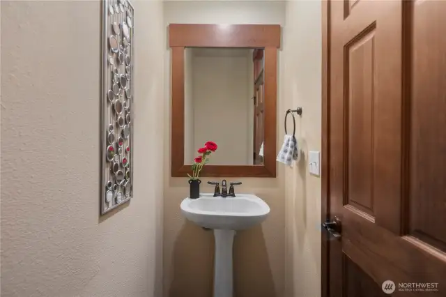 The convenient guest powder room is located on the main floor