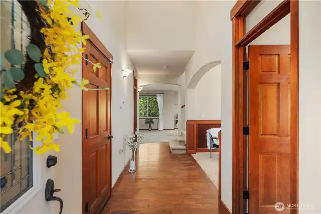 The warm and inviting entryway sets the tone for the home, with its spacious layout and natural light.
