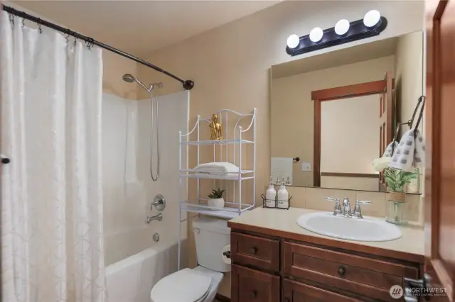The second full bathroom conveniently serves the remaining upstairs bedrooms