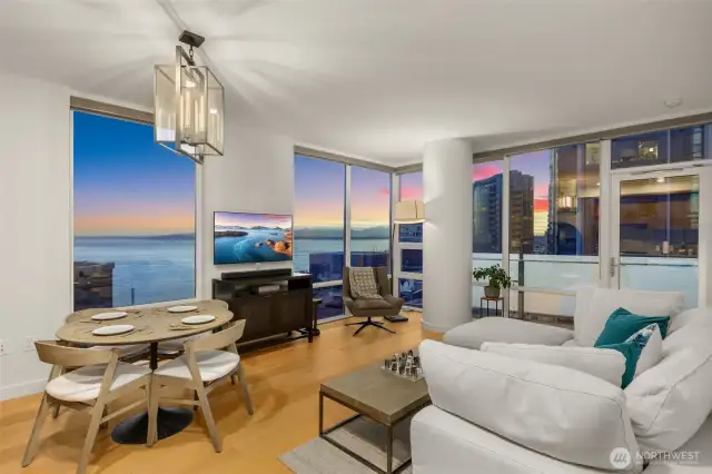 Dreamy west-facing corner unit with floor-to ceiling windows and unubstructed sound, mountain and city views