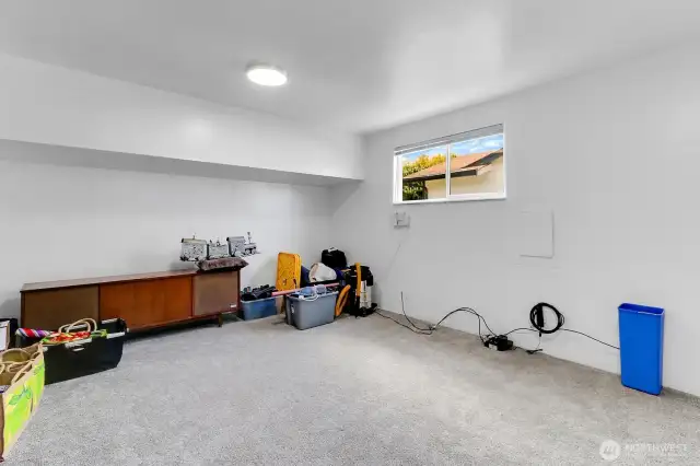 Flex space, plenty of room for storage, hobbies, or a home office.