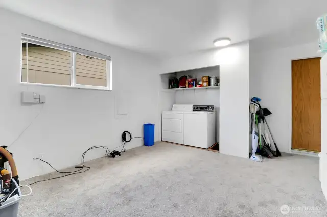 Washer, dryer and hot water tank are located in the flex space.
