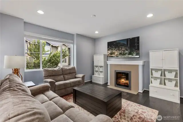 Beautiful living room on 2nd level with gas fireplace