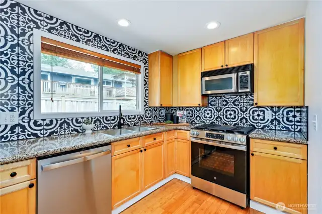 look of the appliances and beautiful tile.