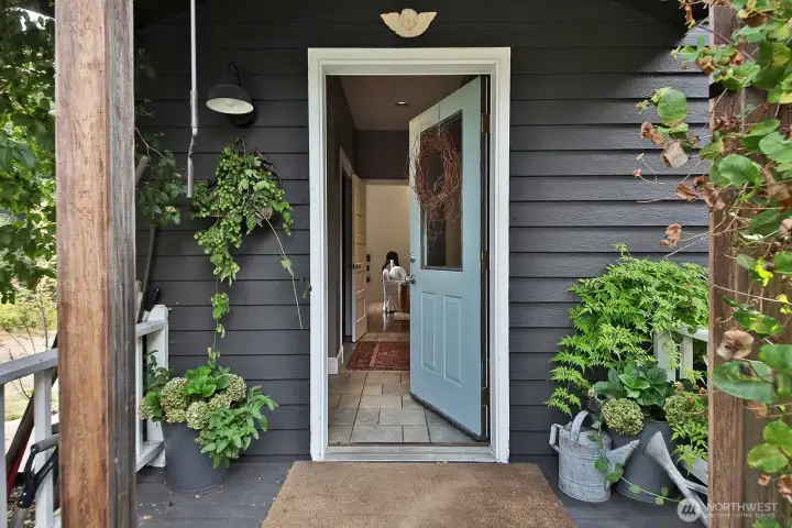 Let's go inside. Sweet covered entry.