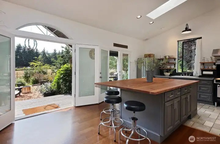Open up to the outside and expand your living onto your front porch and yard.