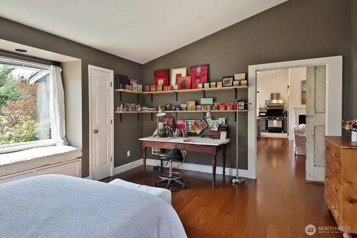Looking back from the Primary in to the main living area. Sweet window seat to take in your pastoral views.