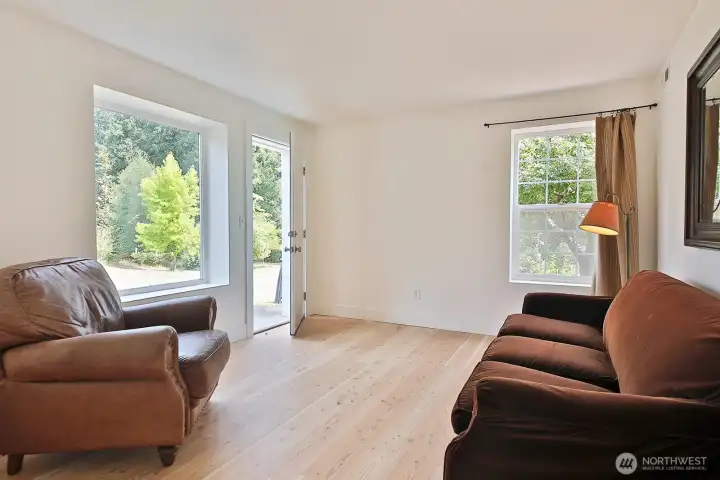 Bedroom #3 currently lives as a sitting area. It has it's own entrance and this room is in the northeast corner of your home.