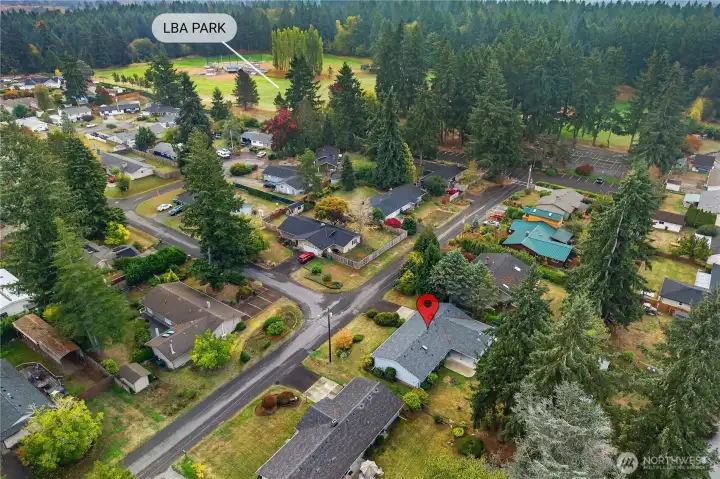 This home has no HOA and is ideally located just half a block from LBA Woods Park, with convenient access to schools and all local amenities.