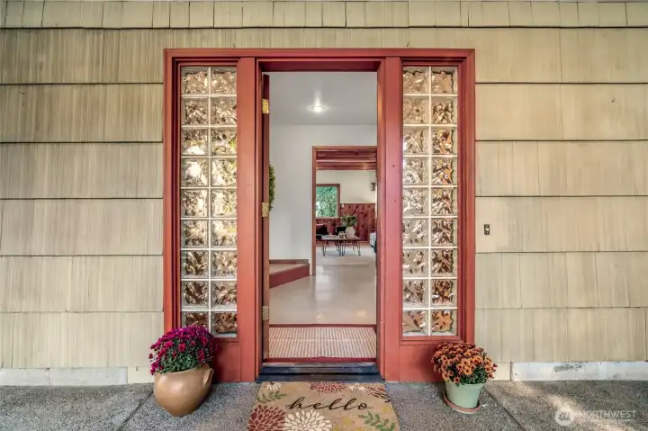 A welcoming front door opens to a large mudroom that connects easily to the family room and kitchen.