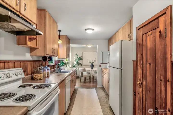 Kitchen, looking lengthwise from the mud room to the dining room.