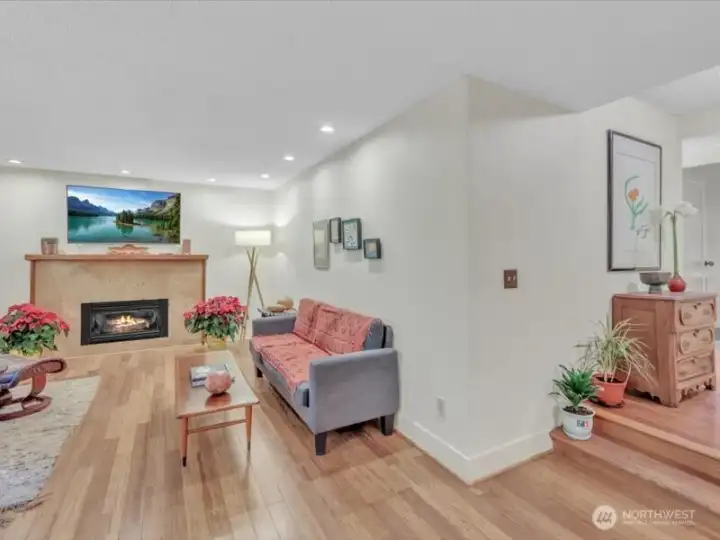 The Gas insert does a terrific job towards heating the home. Notice the Bamboo flooring in Living, dining room, entry and hallway.