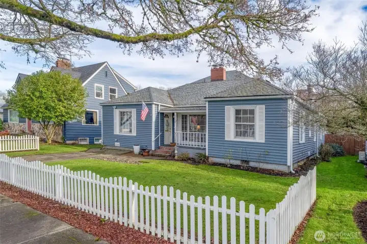 Front View of Home from Sidewalk. Beautiful Front Yard. Street Trees. Newer Room. Vinyl Windows. Off Street Parking.