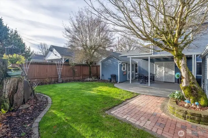 Back Yard. Brick Paver Walkway. Covered Patio.