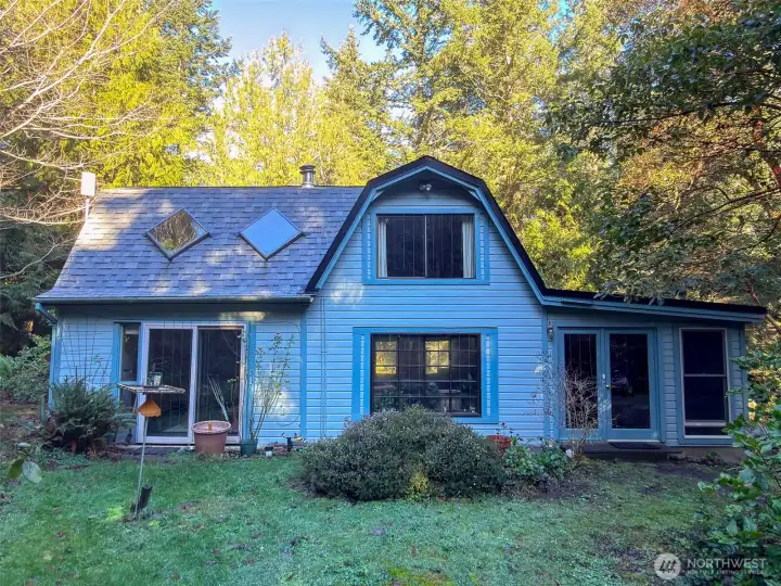 Welcome to a peaceful, private property of almost 4 acres with the cozy home situated in the middle.