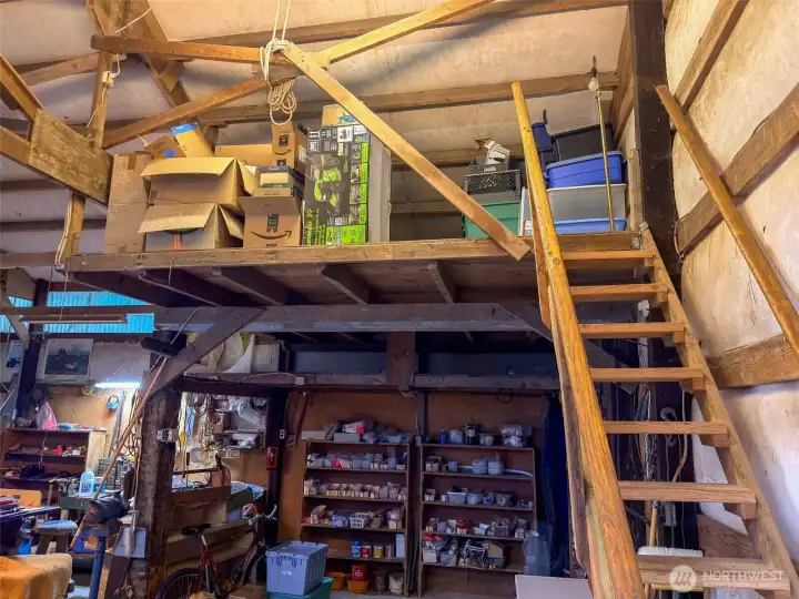 Storage loft and shelves galore!