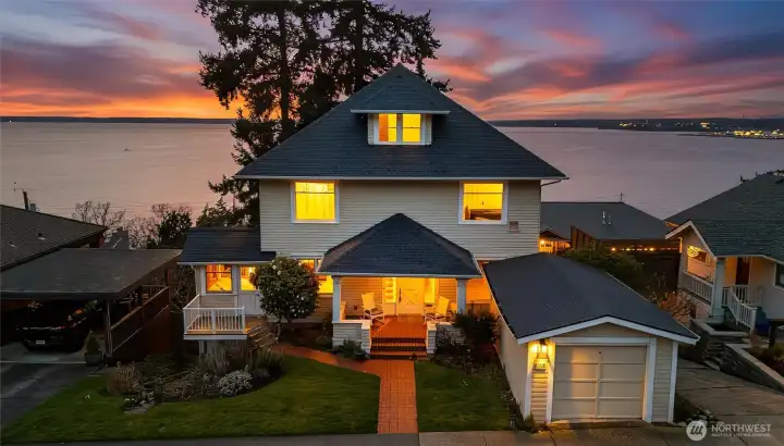 Iconic 1908 American Foursquare overlooking Bellingham Bay with sweeping island and sunset views.