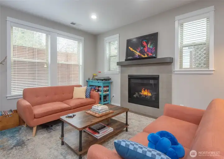 A cozy fireplace to keep you warm through chilly Northwest winters, paired with central air conditioning for comfortable living during beautiful summer months.