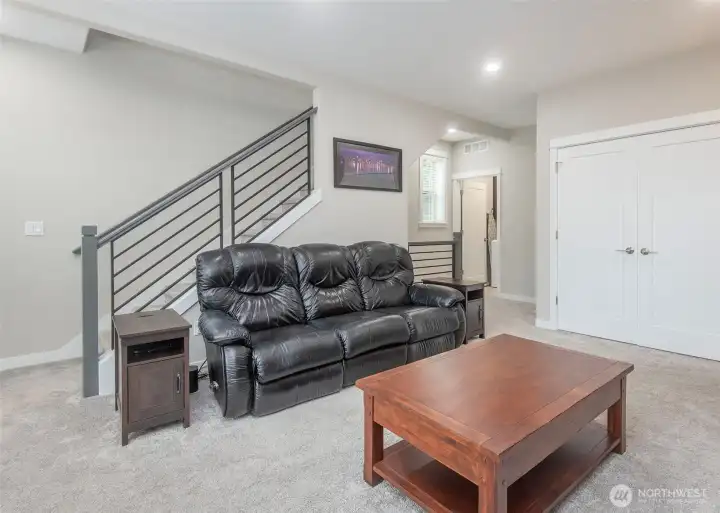 Open rail staircase throughout the home.