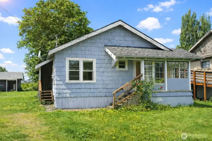 Welcome to your charming single level rambler with covered entry and large yard! Home needs some love, but presents a fantastic opportunity at this price point! *Images from before current tenancy - home is a fixer*.