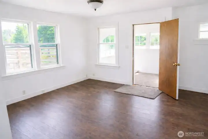 Nice & open living space directly off your covered front porch. *Images from before current tenancy - home is a fixer*.